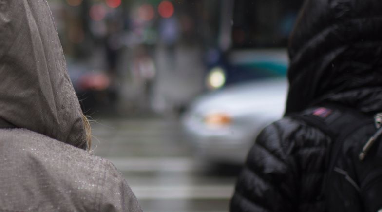 People standing at a zebra crossing